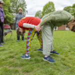 Greeting through the legs